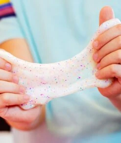 Glow Thinking Putty - Enchanting Unicorn - Thinking Putty Tin 4" | Crazy Aaron's(Glow Thinking Putty Enchanting Unicorn) -Curious Bear Toys Store Enchanting Unicorn Closeup Stretch Lifestyle WEB 1024x1024 7a78b3eb 9ebe 4508 9ce2 896aa05caaa5